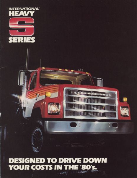 Front cover of a brochure for International Heavy S-Series trucks. Features a color photograph of a truck with light glinting off the chrome bumper, grille, and smokestack. The text reads: "Designed to drive down your costs in the '80's."