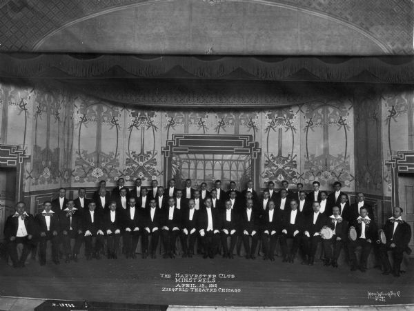 Group portrait of the Harvester Club Minstrels at the Ziegfeld Theatre.