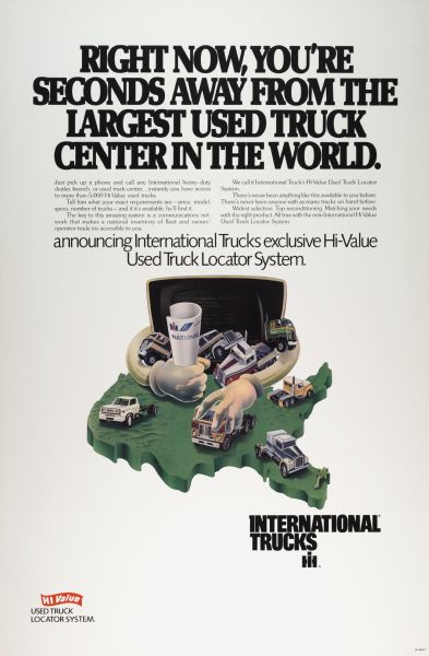 Advertising poster for International trucks featuring a color illustration of a computer monitor with arms placing trucks on a map of the United States. Includes the text "right now, you're seconds away from the largest used truck center in the world" and "announcing International Trucks exclusive hi-value used truck locator system."