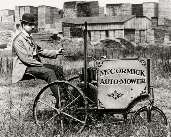 Engineer E.A. Johnston operating a single-cylinder version of the McCormick Auto-Mower at the McCormick Works. Johnston was Director of Engineering for the McCormick Harvesting Machine Company. The Auto-Mower was an experimental gas powered mowing machine.