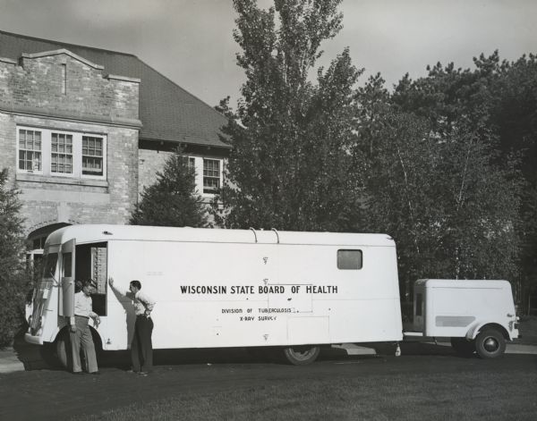 Wisconsin State Board of Health Division of Tuberculosis X-Ray survey bus and trailer.