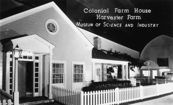 The "Colonial Farm House" in the Harvester Farm exhibit at the Chicago Museum of Science and Industry. Caption reads: "Colonial Farm House, Harvester Farm, Museum of Science and Industry."
