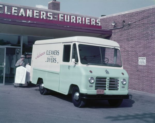Color photograph of an International SM Model Mounting Metro-Van featuring the Metro-Lite Body.  The truck was owned and operated by Advanced Cleaners and Dyers.