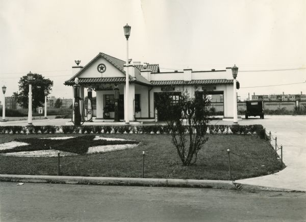 View from road of the landscaping in front of a Texaco gas station located on 83rd and Stoney Island.