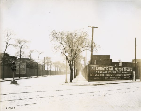 Neighborhood streets near Deering Works, including several International Harvester billboards. One sign reads: "International Motor Trucks, a size and style for every business."