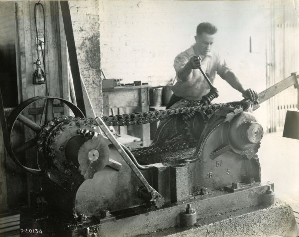 Factory worker at International Harvester's Plano Works. The factory was later known as the "West Pullman Works."