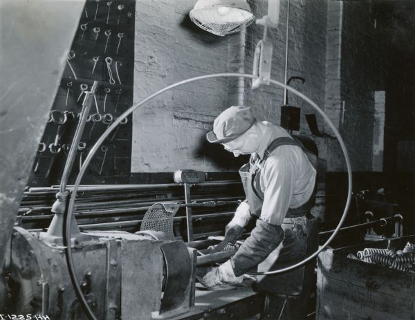 Factory worker at International Harvester's Rock Falls Works.