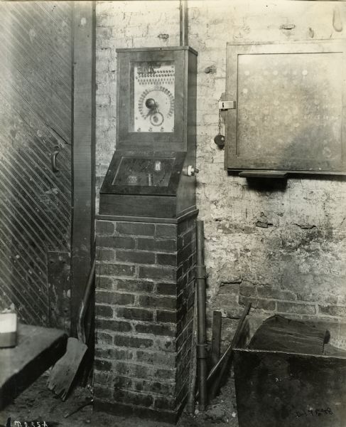 Clock or meter at International Harvester's Akron Works (factory).