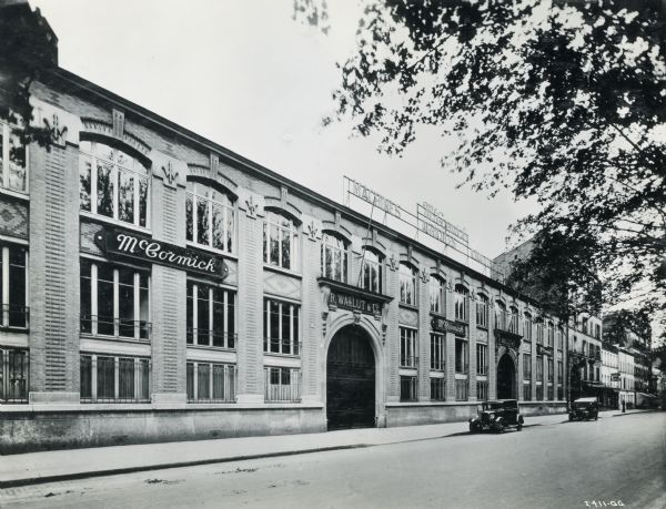 Exterior view of an International Harvester general office at Paris. The office was operated by the Cima-Wallut Machines Agricoles McCormick et Deering, S.A., and located at 168-170 Boulevard de la Villette, Paris, France.