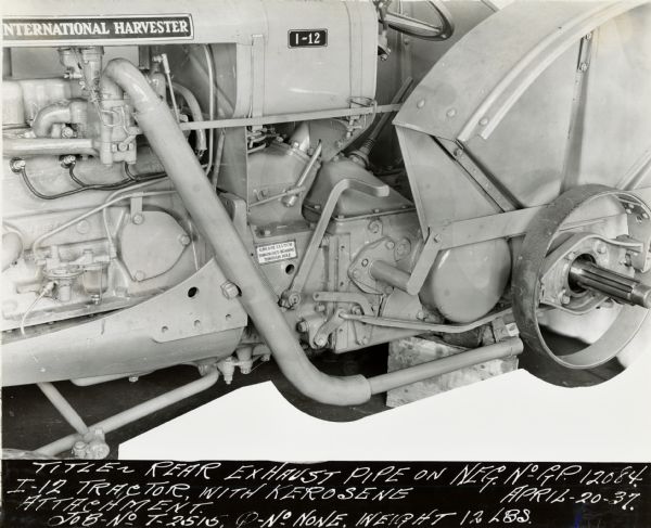 Engineering photograph of an I-12 tractor with kerosene attachment showing the rear exhaust pipe.