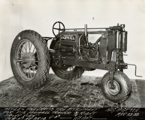 Engineering photograph of a Farmall F-12 tractor with pneumatic (rubber) tires.