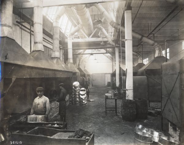 Men working on cream separator parts at International Harvester's Milwaukee Works (factory).