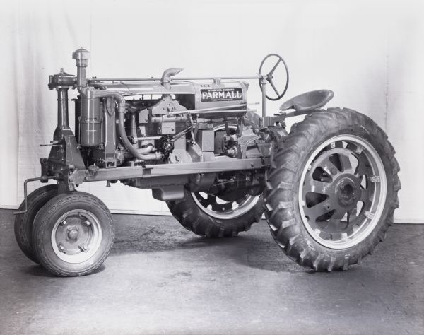 Engineering photograph of a Farmall tractor with rubber (pneumatic) tires.