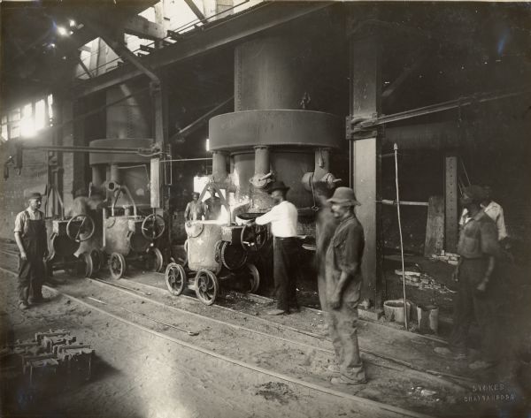 Factory workers in a foundry at the Chattanooga Plow Works.