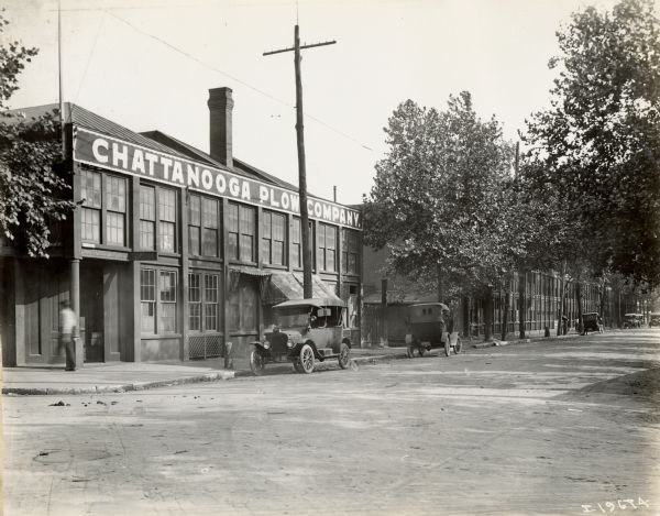 Exterior view from street of the Chattanooga Plow Works. Lettering on the building reads "Chattanooga Plow Company." The photograph was likely taken around the time of the sale of the company to International Harvester. After the sale, the factory became known as the "Chattanooga Plow Works."