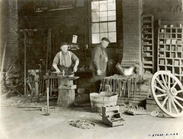 Daniels (left) and Stewart work in their service shop.