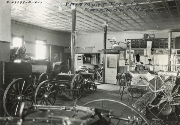Interior view of the showroom at Fairmont Implement Company, an International Harvester dealership.