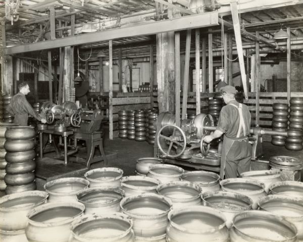 Factory workers working on cream separator bowls at Milwaukee Works.