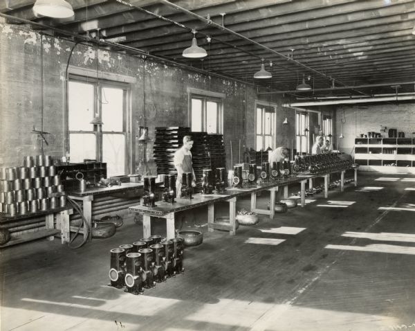Factory workers assembling cream separators at Milwaukee Works.