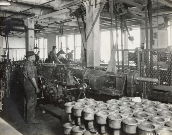 Factory workers at their stations at Milwaukee Works.