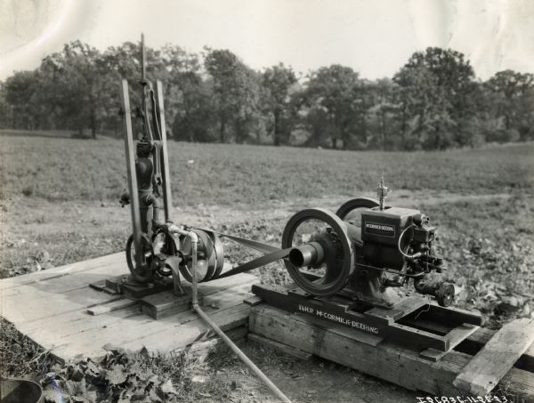 Motorized water pump powered by a 1.5 H.P. McCormick-Deering engine on the farm of Walter Stange(?).