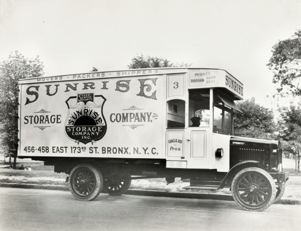 International Model 63 truck operated by the Sunrise Storage Company - "Movers, Packers, Shippers."