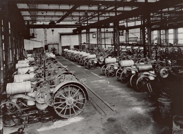 Rows of Titan tractors lined up inside International Harvester's Milwaukee Works factory.