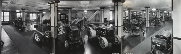 Panoramic view of tractors and other machines on display in the McCormick Works showroom.