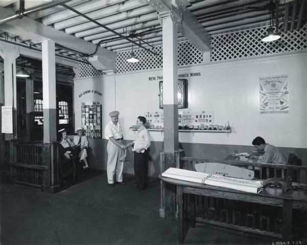 Men in the Repairs Department Sales Room at the McCormick Works factory.