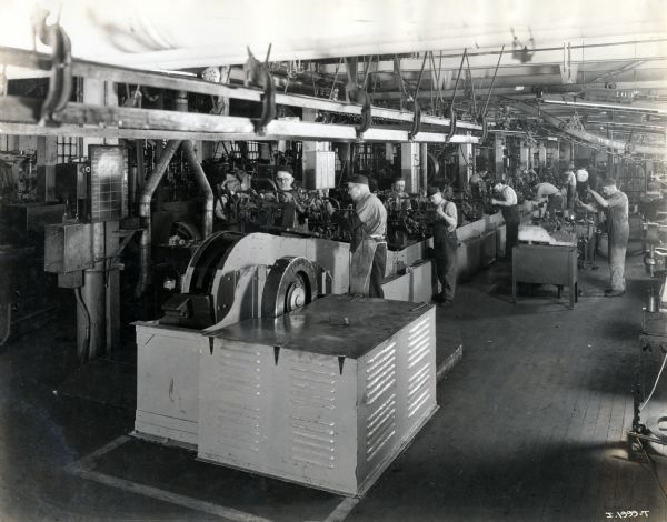 Factory Workers at their stations at the McCormick Works.