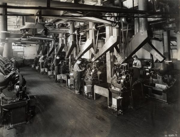 Factory workers at their machines at West Pullman Works.
