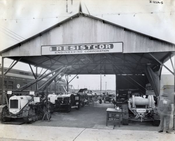 Machinery sits on display under the Resistcor Engineering Corporation's awning at the International Petroleum Exposition.