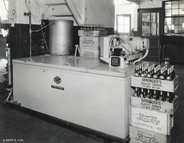 A McCormick-Deering 6-can milk cooler used to store bottles of Pepsi-Cola at Springer Brothers.