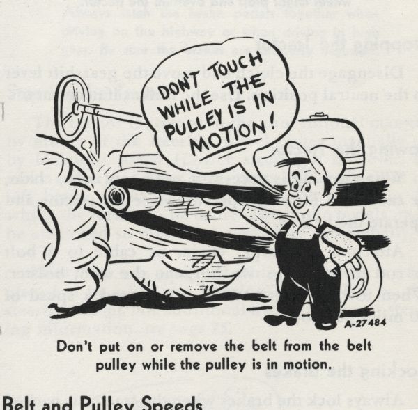Cartoon from an International Harvester operator's manual. The cartoon appears under the heading: "Operating the Belt Pulley". The cartoon depicts a man pointing at the belt pulley on a tractor and saying "Don't touch while the pulley is in MOTION!" A caption under the cartoon reads: "Don't put on or remove the belt from the belt pulley while the pulley is in motion."