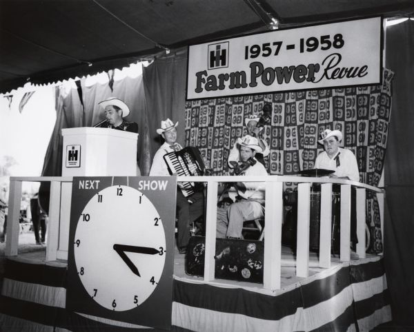 Group of musicians performing at International Harvester's 1957-1958 Farm Power Revue exhibit at the World's Conservation Exposition and Plowing Contests, September 17-20.