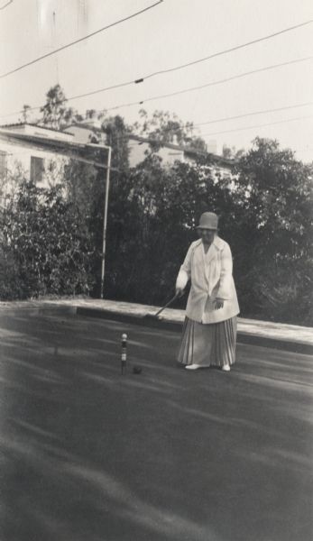 Mary Virginia McCormick (1861-1941) playing croquet. Mary Virginia was the daughter of Chicago industrialist and inventor, Cyrus Hall McCormick.