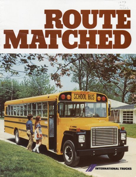 Cover of a brochure advertising International school buses. Features a boy and a girl boarding a school bus. The headline reads: "Route Matched."