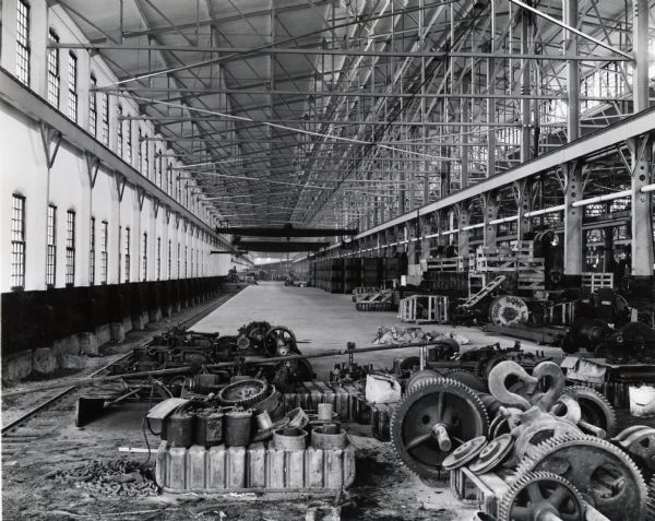 Interior of what appears to be International Harvester's Bettendorf Tank Arsenal (factory).