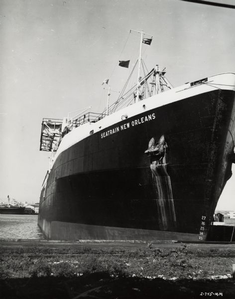 Freighter from New Orleans in port at Habana [Havana?]. The ship is flying the Cuban flag. Another ship is in the background on the left. The ship transported sisal fiber from Cuba to the United States.