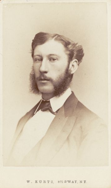 Carte-de-visite studio portrait of Robert Hall McCormick (1847-1917), son of Leander James McCormick (1819-1900). He is wearing a suit jacket and necktie.