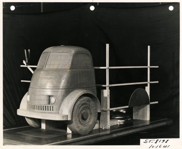 View of a 1/4 size International Harvester truck rendered in clay on a wood frame. The model was likely made by an industrial designer.