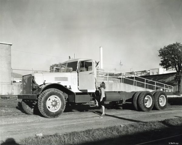 Woman with International Truck | Photograph | Wisconsin Historical Society