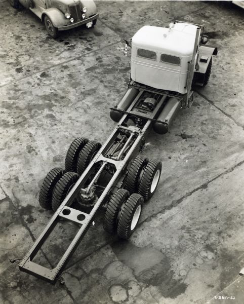 Elevated view of an International truck with cab and exposed chassis.
