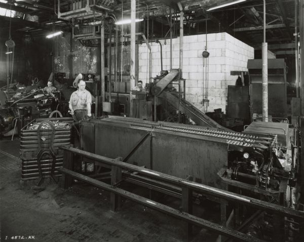 Factory workers at International Harvester's Tractor Works.