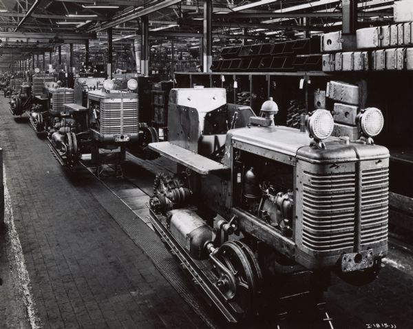 Crawler tractors (TracTracTors) on a factory assembly line at International Harvester's Tractor Works.