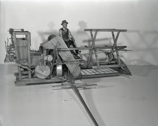Scale model of a McCormick grain binder with Gorham binding attachment.