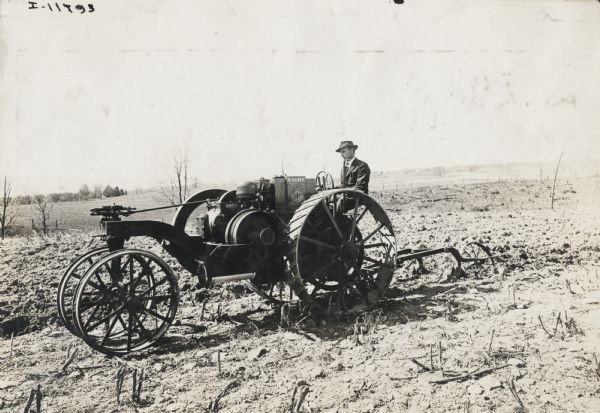 Man plowing with a Mogul 8-16 tractor.