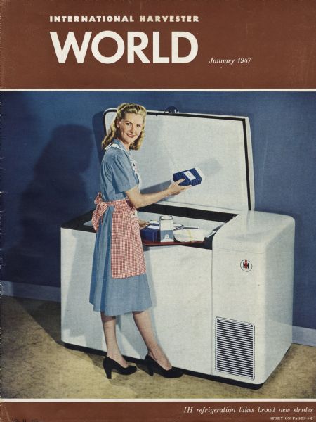 Woman with an International Harvester freezer on the cover of <i>Harvester World</i> magazine.