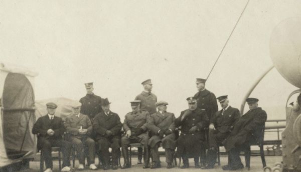 Root Commission members seated aboard the deck of the <i>Buffalo</i>.