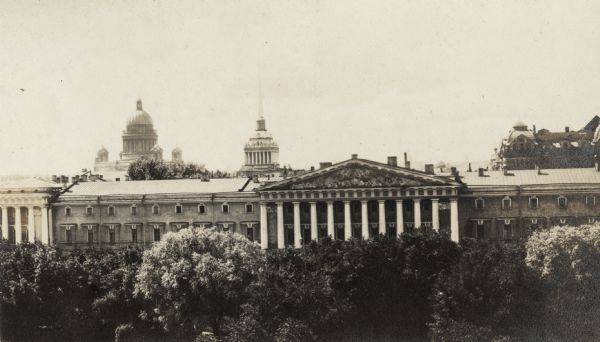 View of buildings in Petrograd (St. Petersburg) from the Winter Palace. Original caption reads: "Russian Senate (Supreme Court), Marine Tower and St. Isaac's dome from the Winter Palace."